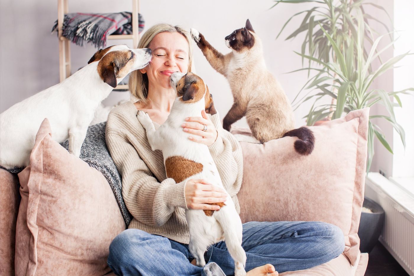 A family with their pet, together thanks to financial assistance from Joyful Pets Rescue
